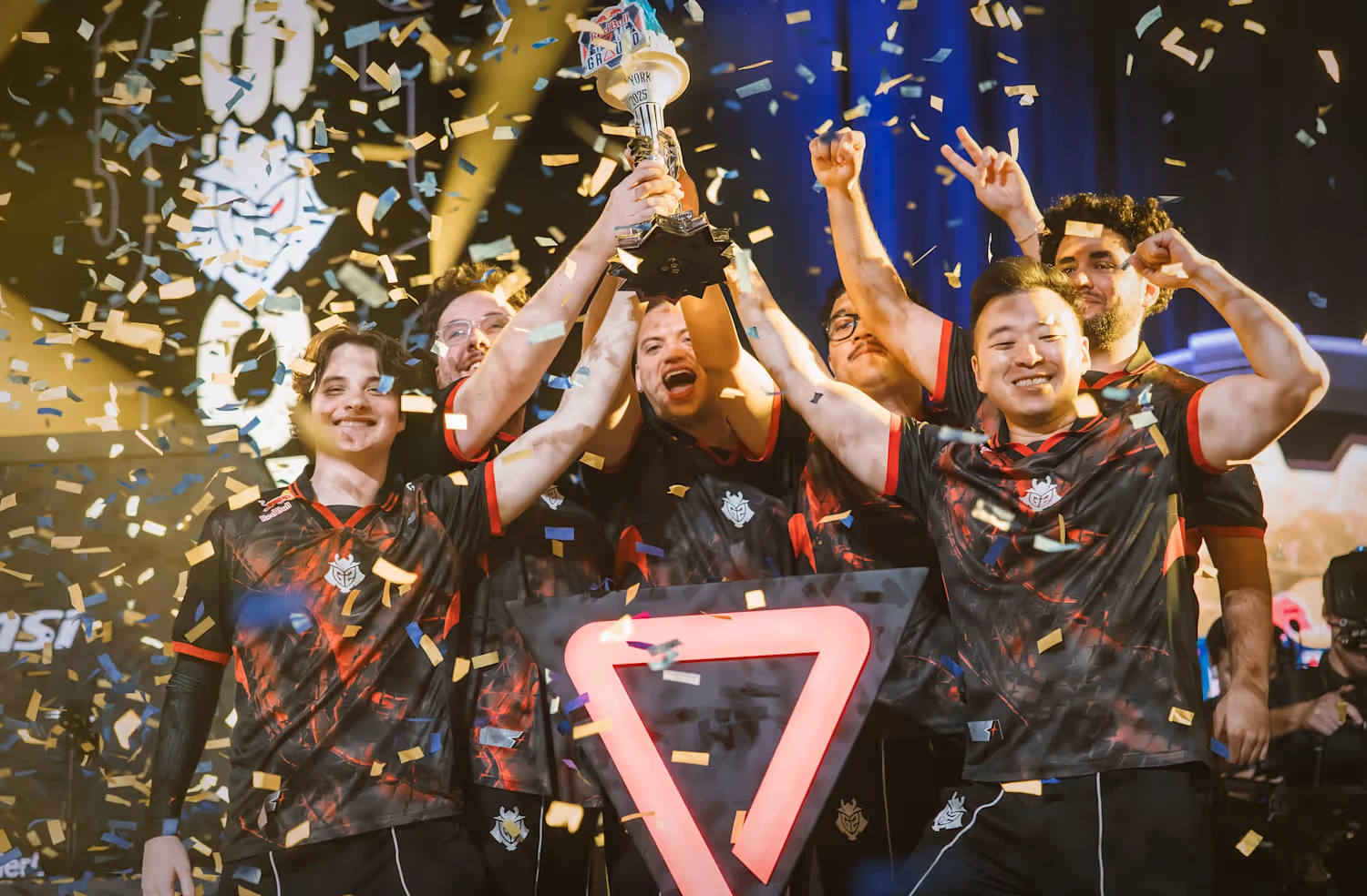 G2 Esports lifting the Red Bull Home Ground torch trophy by Hoku Props under confetti