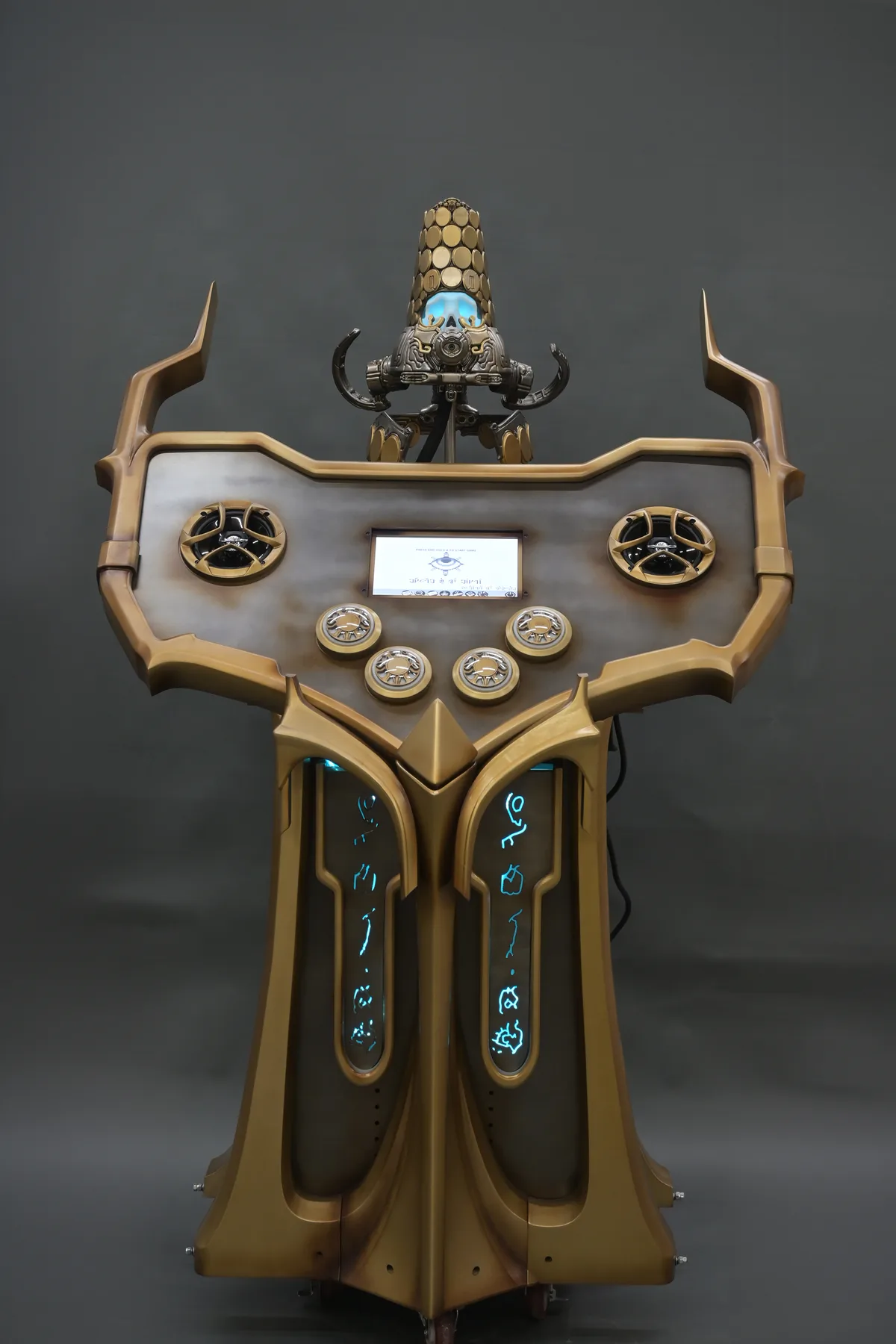 The Secrets of the Sanctum trivia cabinet built by Hoku Props, Loid and Otak above a lit control panel