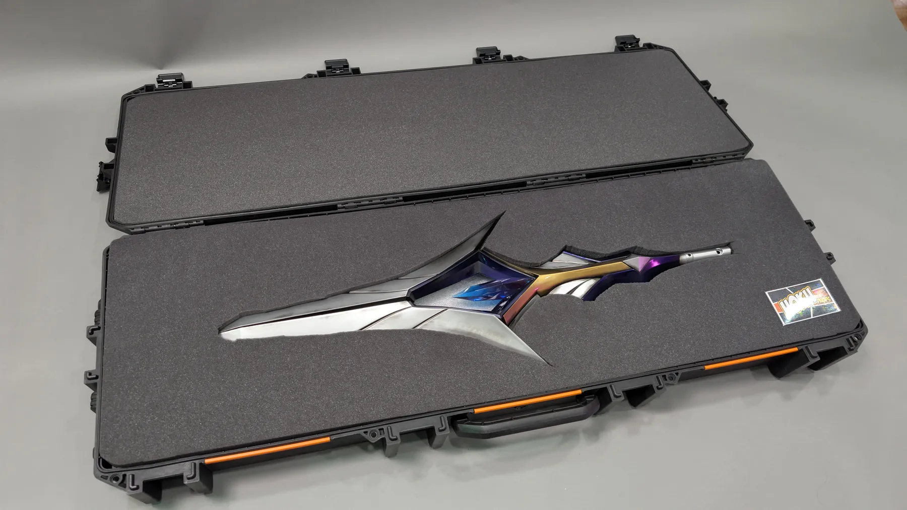 A finished spear built by Hoku Props seated in cut foam inside its road case, ready for delivery